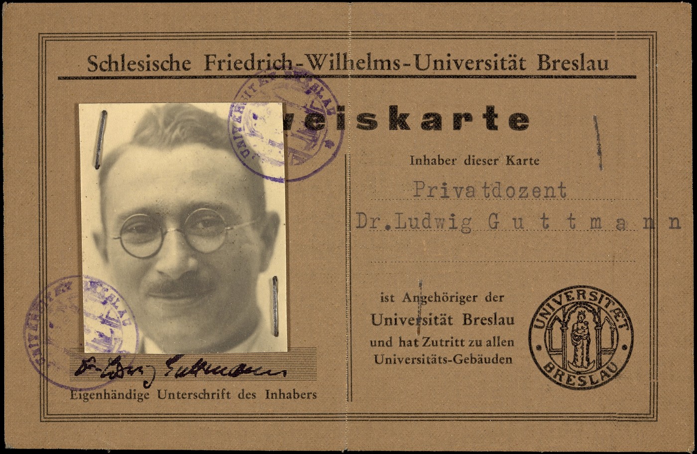 图24 Ludwig Guttmann（路德维希·古特曼）在Breslau大学时期的证件。德文身份栏注明他是Privatdozent（私讲师），并列出所属大学。证件上还保留他的照片、签名与校章。